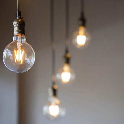 vintage light bulb hanging from ceiling for decoration in living room.